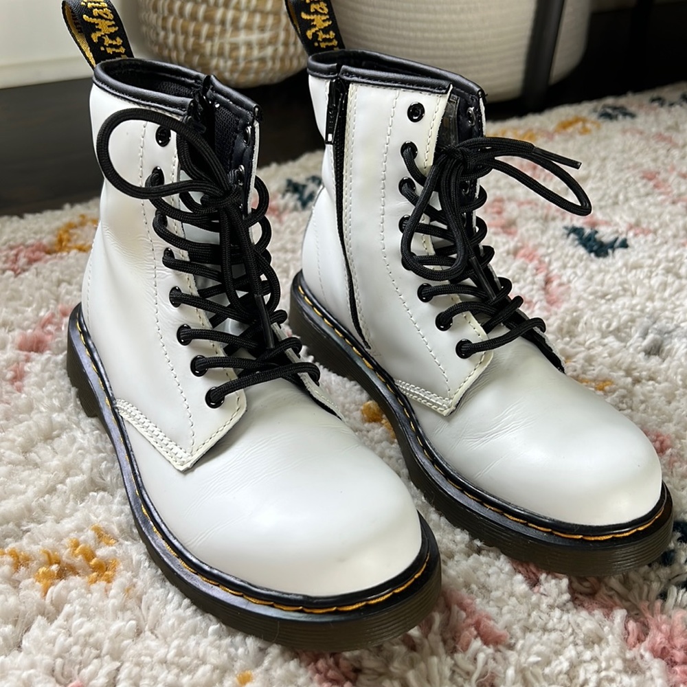 On trend, white Doc Martin boots